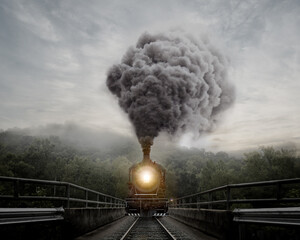 Front of a moving train blowing smoke
