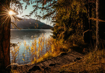 autumn walking path next to White lake in Austria