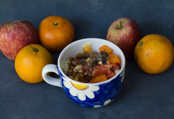 tropical fruit salad on blue-gray background