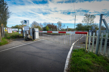 Railroad crossing on country road near Canterbury, Kent, England.