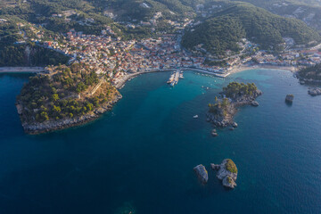 Fototapeta na wymiar Aerial shot of medieval fort and port town of Parga in West Greece Preveza