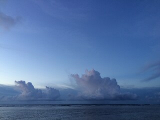 Naklejka na ściany i meble clouds over the sea Bolinao, The Philippines 
