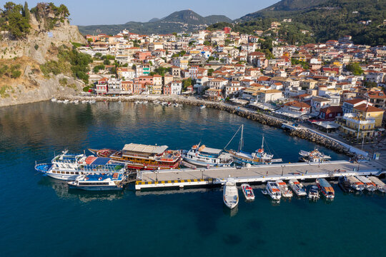Aerial shot of port town of Parga and moored boats in West Greece Preveza