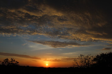 Fototapeta na wymiar Beautiful dark orange sunrise in West Texas