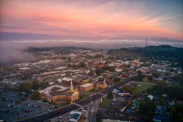 Fototapeta premium Aerial View of Sevierville, Tennessee on a Hazy Fall Sunrise