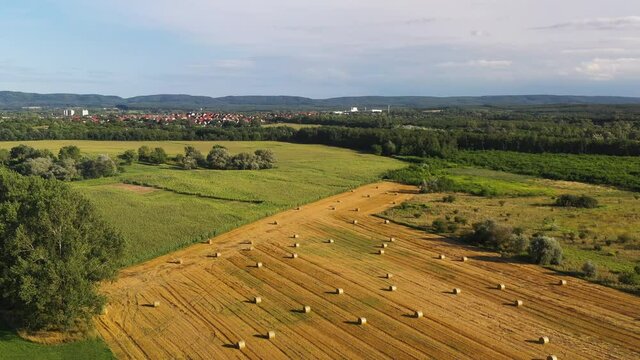 Wide drone shot of hay field in the Hernad Valley in Hungary