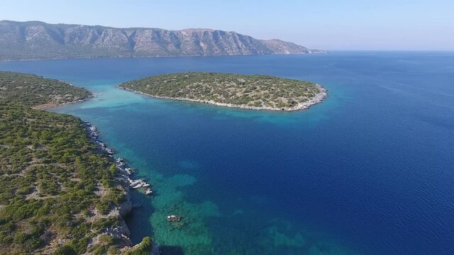 Aerial approach of Kasonisi islet next to Samos island in Greece.