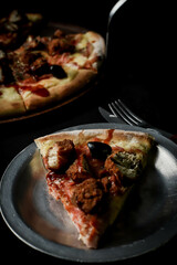 Porción de pizza de pollo