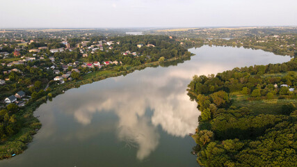 Fototapeta na wymiar Cloud In Reflection In Lakes, Village in Valley, Horizon, Sown Fields, Ukraine, Stavishche