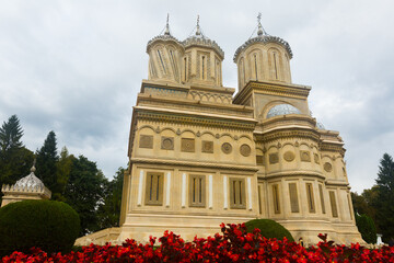 View of Romanian Orthodox Cathedral of Curtea de Arges in sunny autumn day