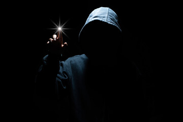 Hacker at work with graphic user interface around.