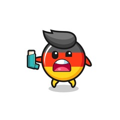 germany flag mascot having asthma while holding the inhaler