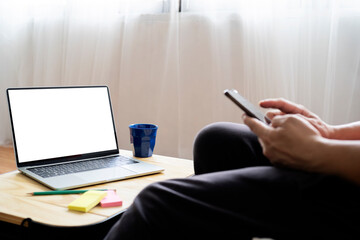 Fototapeta premium mockup image computer,cell phone blank screen for hand typing text