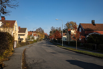 Fototapeta na wymiar Stockholm, Sweden A residential street in the Arsta suburb.
