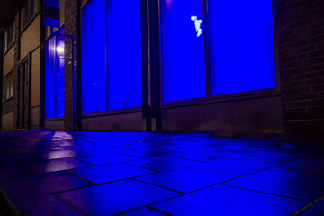 Stockholm, Sweden The blue light coming out from a solarium window at night. 