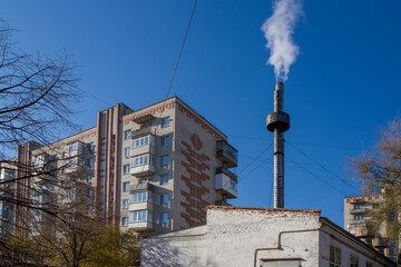 Boiler room in the courtyard of a multi-storey building.