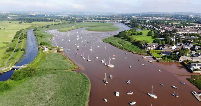Aerial View Of Sailboats Anchored In River Exe In Topsham. Pedestal Down, Tilt Up