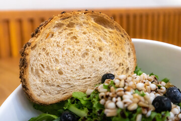 a salad meal with fruit and vegetables