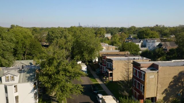 Drone Flying Over Poor South Side Neighborhood, Reveals Chicago Skyline In Summer