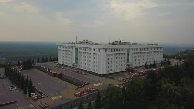 The Republic House with forest and city building. Ufa, Bashkortostan