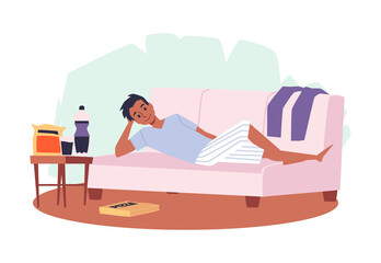 Fototapeta premium Young male lay on couch eating junk food pizza, chips and soda.Man has his lazy rest time, messy clothes around his home