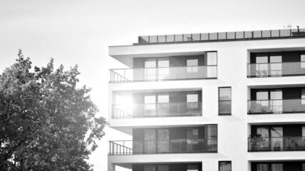 Modern apartment building. Modern urban architecture and details of building facade. Black and white.