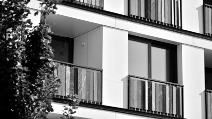 Modern apartment building. Modern urban architecture and details of building facade. Black and white.