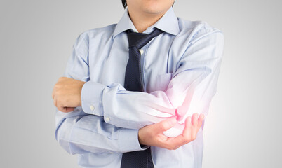 office worker feels pain elbow , elbow bones injury