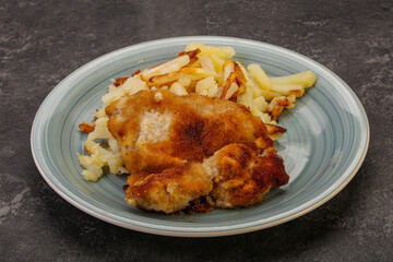Pork schnitzel with roasted potato