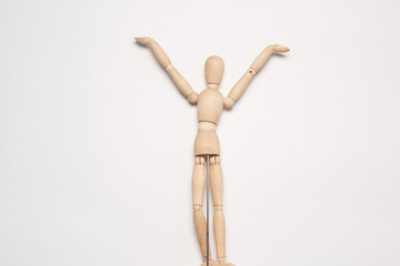 wooden mannequin object light background posing toy