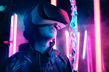 Neon lgiht portrait of girl in VR glasses - obrazy, fototapety, plakaty