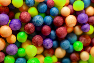 Fototapeta na wymiar Background of colorful balls. top view.