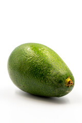Avocado on a white background. Combined with the shade of ripe avocado. Story format close-up