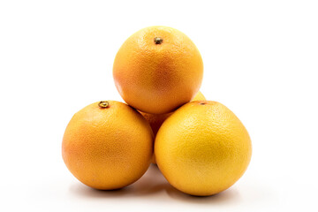 Grapefruit on a white background. Along with the ripe Grapefruit shade. close up