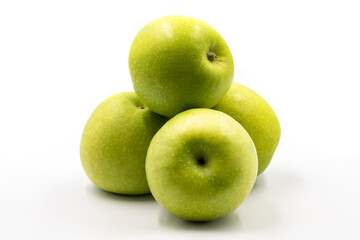 Sour apples on a white background. Ripe Green combined with a shade of sour apple. close up