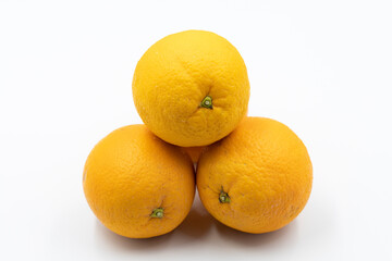 Orange on a white background. In combination with a ripe orange shade. Close-up