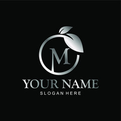 letter M logo and leaf circle. premium vector letter M with silver luxury color leaf. letter M metal model