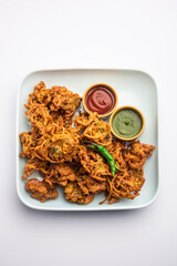 Pyaj Pakora or onion fritters or kanda bhajji