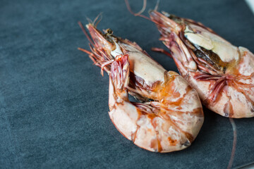 Prawn sea shrimp grilled on black plate