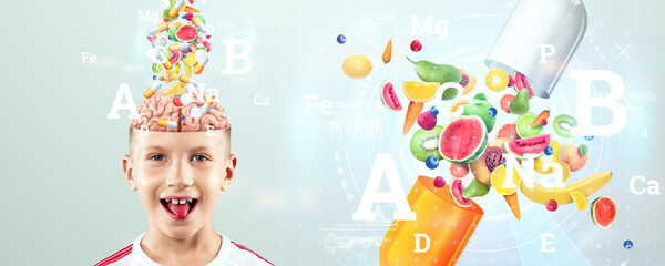 Vitamins and nutritional supplements in the form of medical capsules fall directly into the child's...