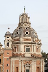 Fototapeta na wymiar Santa Maria di Loreto Church Exterior with Dome and Bell Tower in Rome, Italy