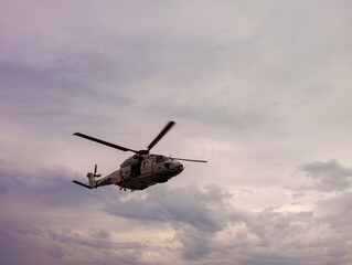 Fototapeta na wymiar military elicopter in action