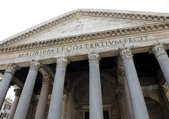 Fototapeta premium Pantheon with the columns seen from below and the Latin inscription that means Marco Agrippa, son of Lucio built it in the year of his third consulate