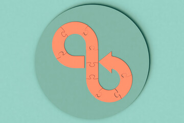 Three dimensional render of infinity symbol made of blank jigsaw pieces