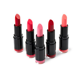 Lipsticks over white background