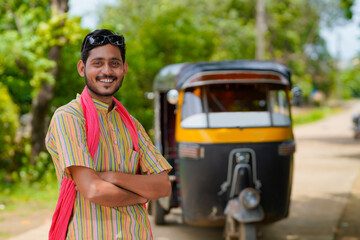 Indian auto rickshaw three-wheeler tuk-tuk taxi driver man. - obrazy, fototapety, plakaty