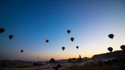 Hot air balloons on the sky at sunrise in Cappadocia Turkey