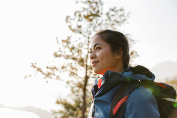Hiker with backpack smiling