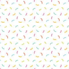 Colorful confetti, sprinkles vector seamless pattern background for party, festival, birthday celebration design.
