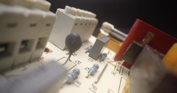 Movement Circuit board closeup with probe lens sliding